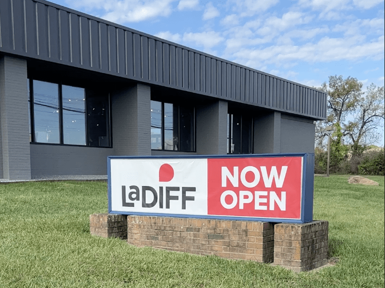 LaDiff Now Open sign outside of a building