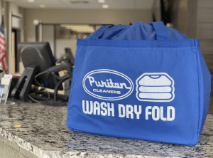 Puritan Cleaners Wash Dry Fold bag on a counter