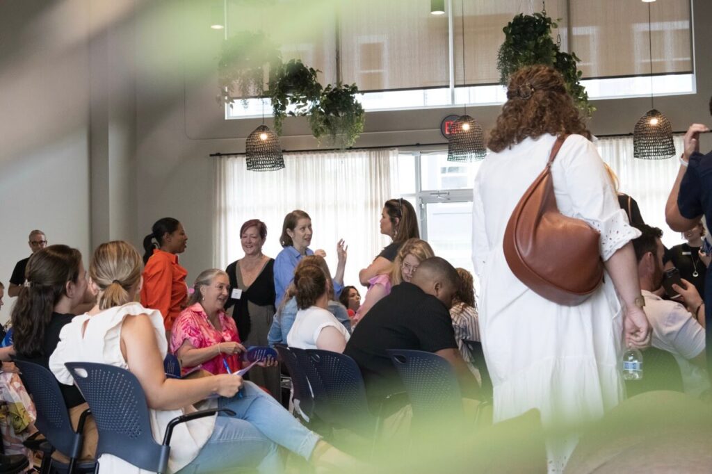 InUnison members talking and connecting at an InnovateLocal community event